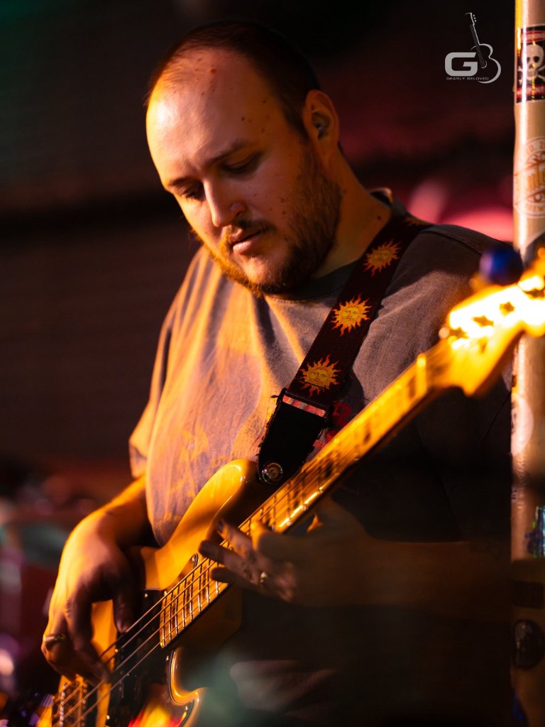 Dub Nectar bassist performing live